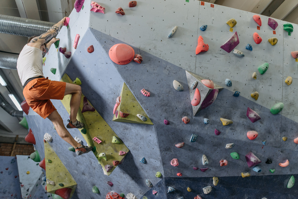 A Man Climbing a Rock Wall